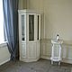 Corner Cabinet-cupboard. Has six sections with shelves for storage. Shelves behind glass doors glass handling euroedge.