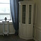 Corner Cabinet-cupboard. Has six sections with shelves for storage. Shelves behind glass doors glass handling euroedge.