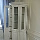 Corner Cabinet-cupboard. Has six sections with shelves for storage. Shelves behind glass doors glass handling euroedge.