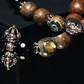 Украшения handmade. Livemaster - original item Men`s designer bracelet made of expensive wood, Onyx with a Skull. Handmade.