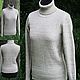 Knitted from flax .Women's turtleneck