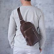 Сумки и аксессуары handmade. Livemaster - original item Men`s leather shoulder backpack 