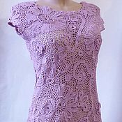 Warm knitted dress with openwork inserts