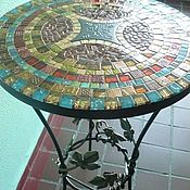 Wrought iron table and rack with mosaic 