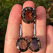 Incredible earrings made of silver with natural garnet