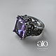 Men's ring with amethyst! The coating is white and black rhodium. 925 sterling silver.
