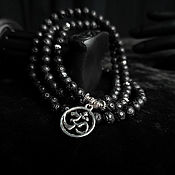 Работы для детей, handmade. Livemaster - original item Rosary beads-bracelet made of black lava with the symbol 