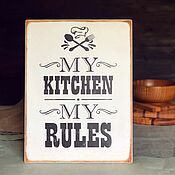 A sign on the wall. For kitchen