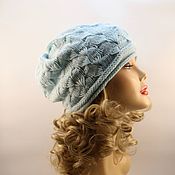 Hat with large openwork brim made of natural rafiia
