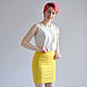 Yellow pencil skirt.
