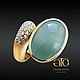 Gold ring with aquamarine and diamonds. 750