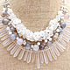 Large three-row necklace shades early spring from rock crystal, agate and moonstone has a maximum length along the upper edge 42 cm Chain allows you to adjust the length.