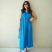 A silhouette dress made of Blue wool, a woolen dress for the office is fitted