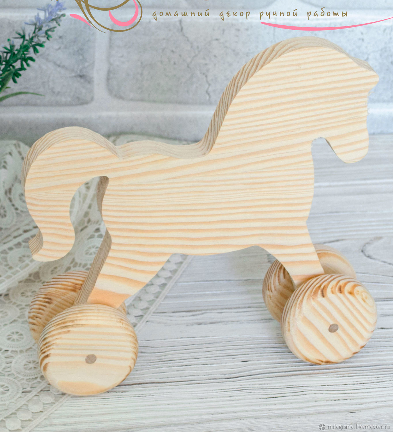 wooden toy duck on wheels