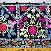 Uzbek silk ikat. The cloth hand weaving of Adras