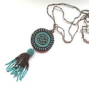 Украшения handmade. Livemaster - original item Pendant on a knitted cord with beads 