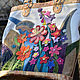 Bright flowers in the garden by the river, a riot of colours on a white background is the summer package. And the finish puts the sun in this bag.

