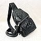 Men's bag, made of embossed crocodile skin, black color