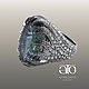 Luxurious large ring with colored mystic Topaz 34.41 Carat and cubic Zirconia 200 PCs.
