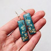Wooden-based earrings in the technique of 