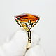A spectacular gold ring with a large luxurious 27.7 ct citrine and cubic Zirconia!     Handmade.
