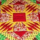 Центр лоскутной композиции - яркое лучистое солнце.