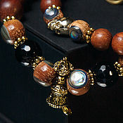 Украшения handmade. Livemaster - original item Brown wood and onyx bracelet with vajra. Handmade.
