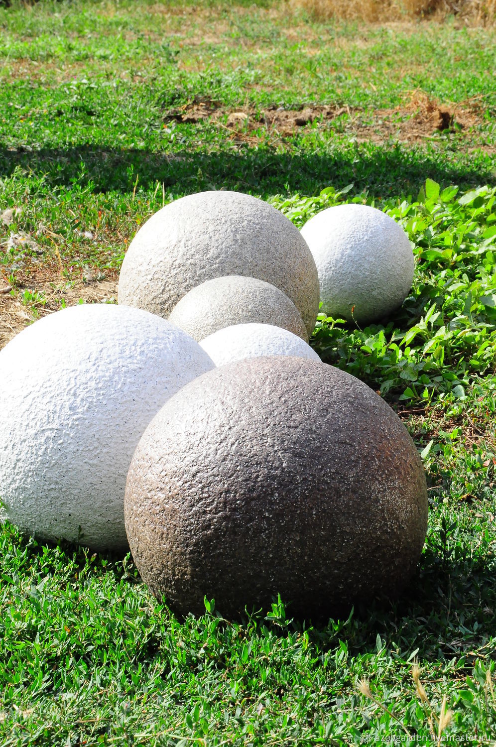 Concrete ball for garden pommel on a pole concrete hemisphere
