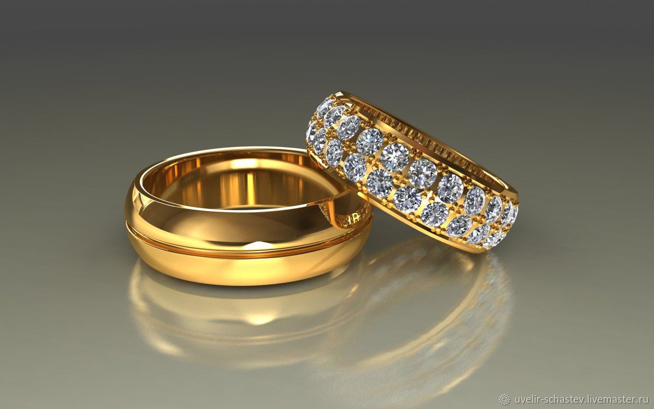 Золотые обручальные кольца с камнями