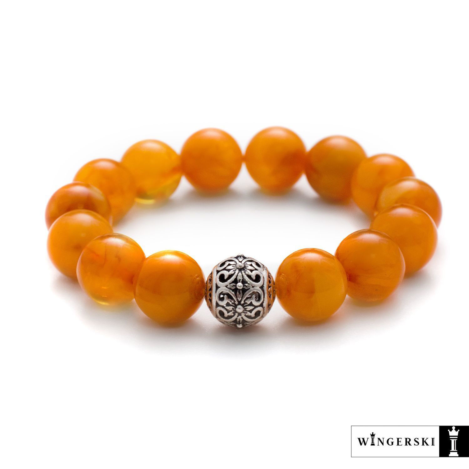 Женский браслет из балтийского янтаря с серебряным шармом купить в ...
