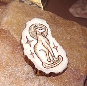 Natural Stone under an engraving of an amulet, in assortment