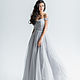 Wedding dress Trudy made of draped tulle dusty-gray hue will beautifully accentuate the figure of any bride. Open-shouldered, slightly pritalen delicate draped fabric-model looks
