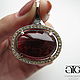 Made to order. Luxurious pendant with gorgeous large Hessonite garnet Carat 65.21 and citrines.
