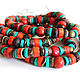 Bright long beads collected from various form and texture of beads in red and turquoise and brown colors. Coral, turquoise, Tibetan beads, coconut, volcanic lava, Jasper and petersite.
