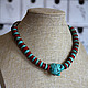 Spectacular turquoise and coral beads with a large nugget in the centre - a striking piece of jewelry with an ethnic touch.