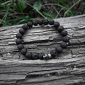 Украшения handmade. Livemaster - original item Bracelet made of black lava with a skull (on an elastic band). Handmade.
