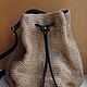 Bag-bag: knitted jute backpack