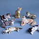 Фарфоровые копии реальных кошек : слева на право -  Муся и Зося, Алиса, Гоша, Ася, Лёлик и Тося