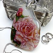 pendant with painted mother of pearl white rose on a pearly suspension