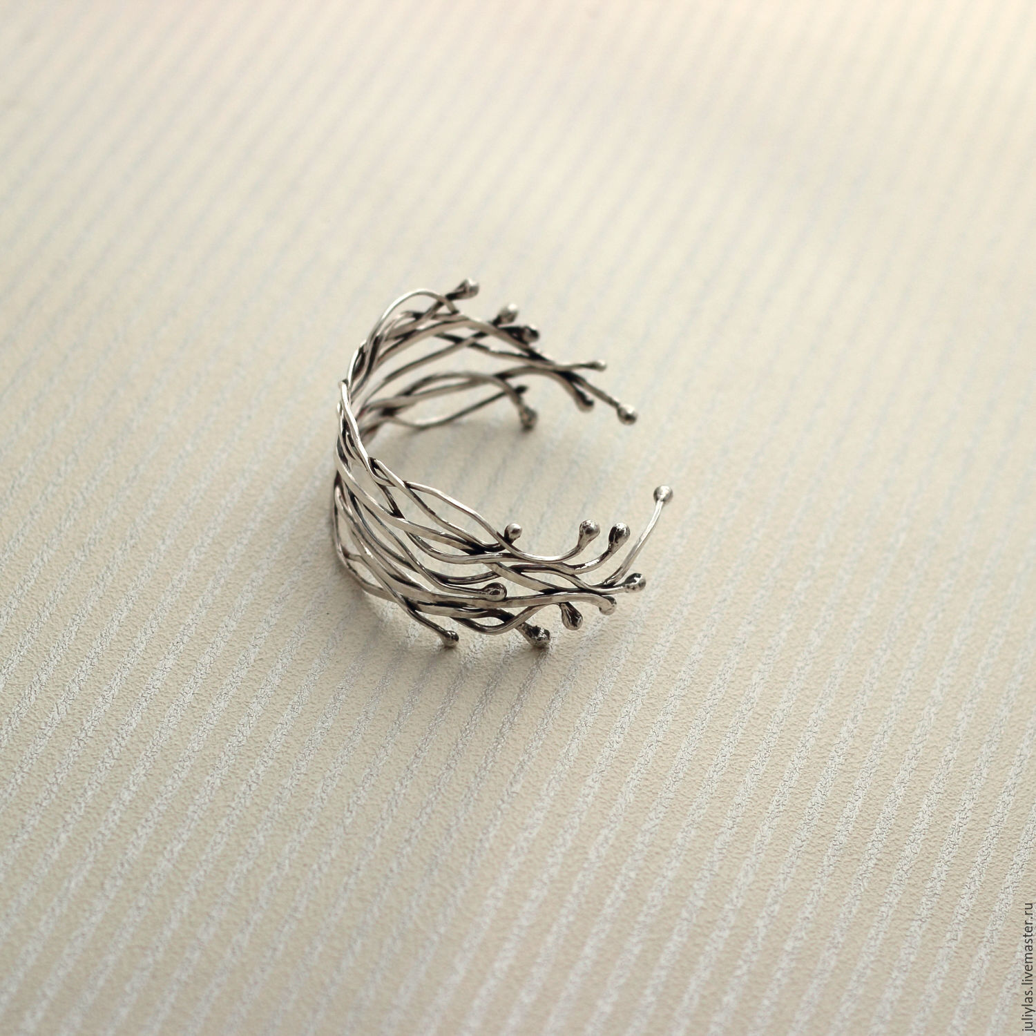 Плетеное кольцо из серебра
