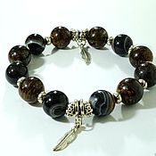 Bracelet made of natural stones from the cat's eye 