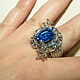 кольцо из серебра 925 пробы с двумя натуральными голубыми топазами