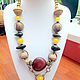 Ethnic beads from seeds and fruits of exotic plants in the Jungle. The author's work. Handmade necklace.
