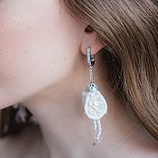 Long ball earrings on a chain with large pearls