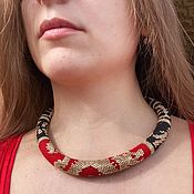 Necklace made of Python beads
