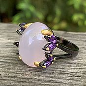 Silver ring with opals
