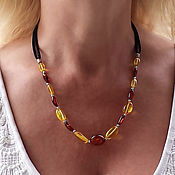 Работы для детей, handmade. Livemaster - original item Beads made of natural amber on a suede cord. Handmade.