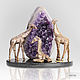 Giraffe symbolizes luck, prosperity, happiness and wealth, is designed to protect people from folly. Amethyst stabilizes the space, gives a new impetus to the development of the company and employees.