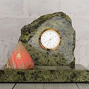 Clock made of stone and onyx