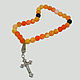 Christian rosary of yellow agate with black agate dividers
